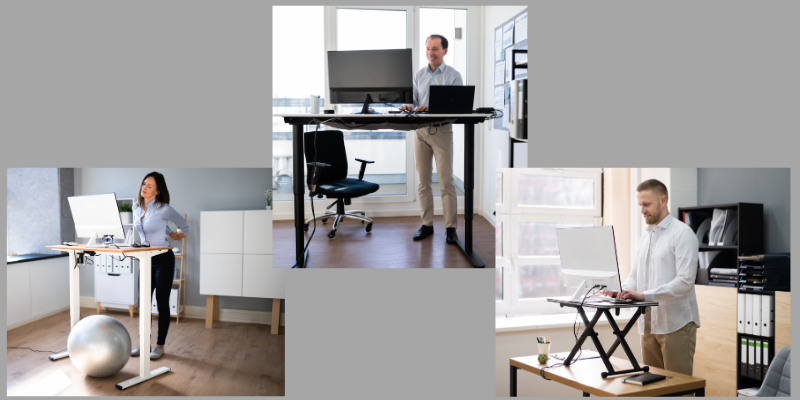 3 office workers using standing desks